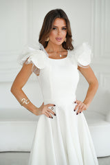 Cocktail dress with impressive sleeves in off-white