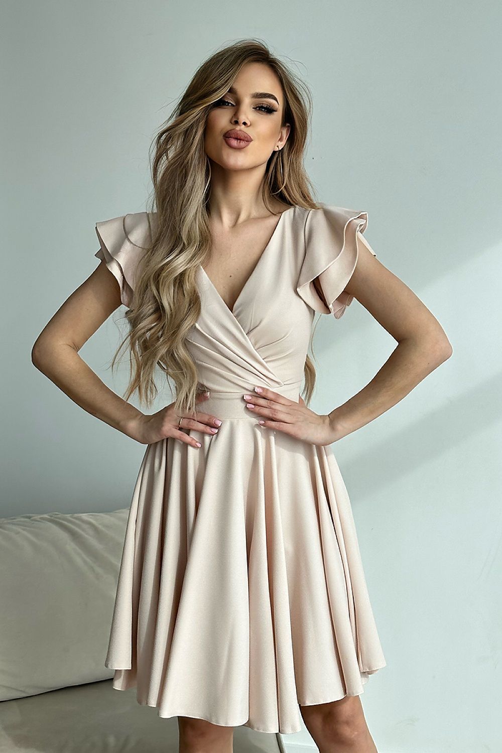 Cocktail Dress With Beautiful Ruffles On The Sleeves In Beige